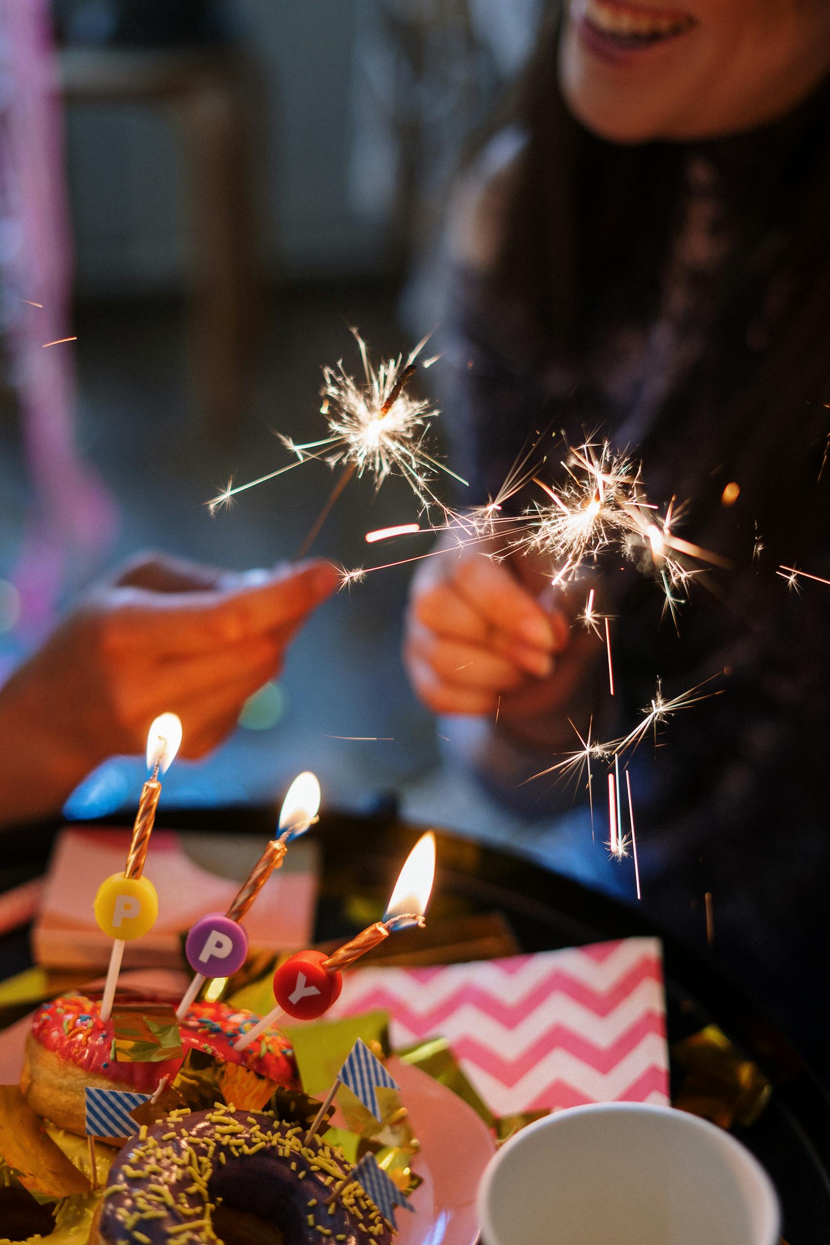 Lighted Candles on Doughnuts
